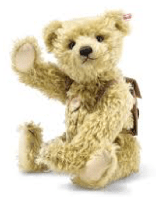 A contemporary mohair teddy bear wearing a backpack that’s probably full of hugs.