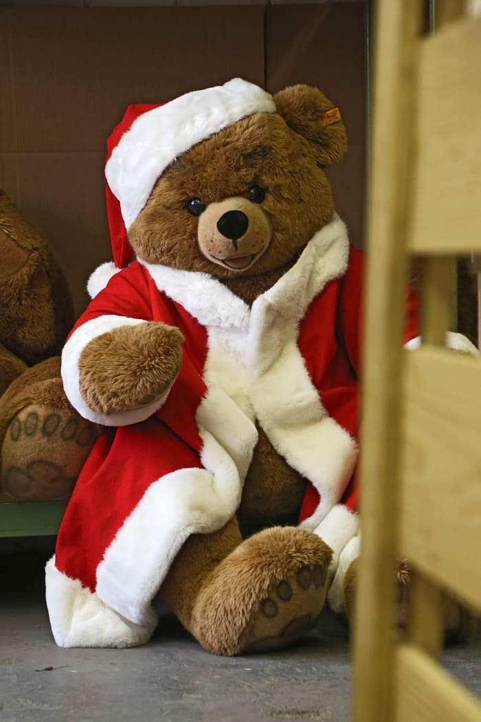 A teddy bear wears a Santa Claus costume at the Steiff stuffed toy factory in 2012. Teddy bears are among the most popular children’s toys.