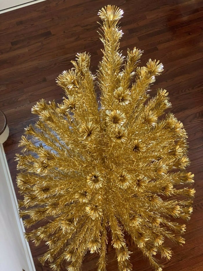 A vintage pom-pom tree in a rare gold color, 6-1/2-feet high with 151 branches; $4,050.