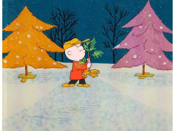 A Charlie Brown Christmas production cel (Bill Melendez, 1965) of Charlie picking a scrawny real tree instead of a shiny aluminum one. Many point to this moment as the start of the decline in popularity of aluminum trees. This cel sold at auction for $21,510.