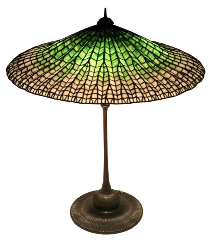 Tiffany Studios' table lamp with “Lotus” shade. Sold by Clarke Auction through LiveAuctioneers for $150,000.